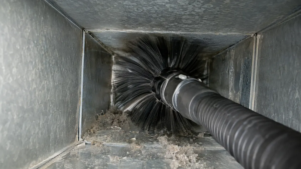 Commercial ceiling diffuser opened for air duct cleaning