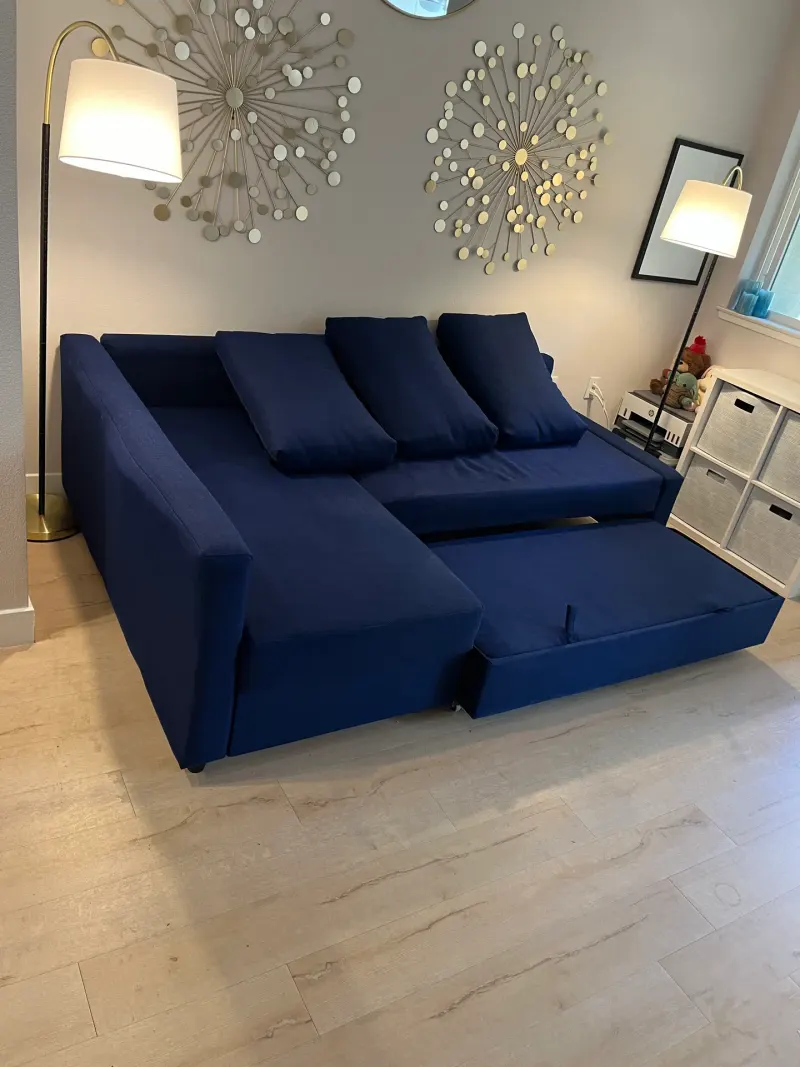 Navy sectional cleaned in a customer living room