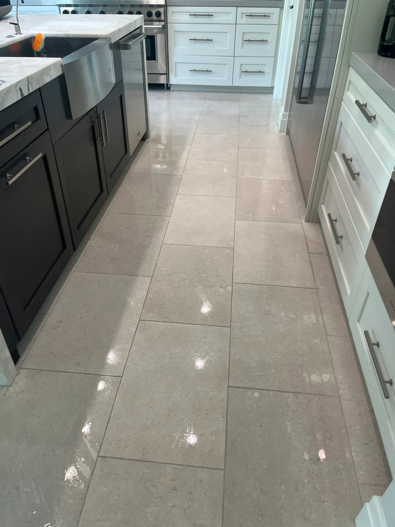 Tile floor in a kitchen after cleaning