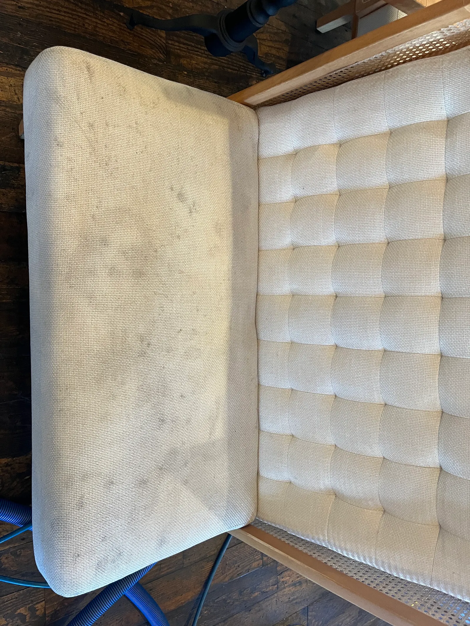Upholstered chair with a soiled seat